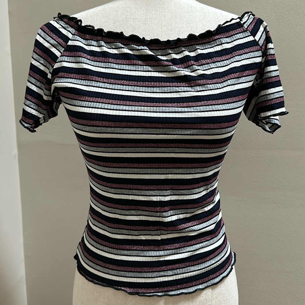 Striped tight fitting t shirt.